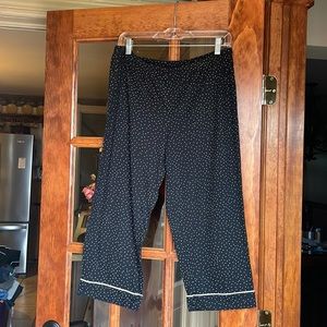 Black and white pajama set. Button down shirt/capris.